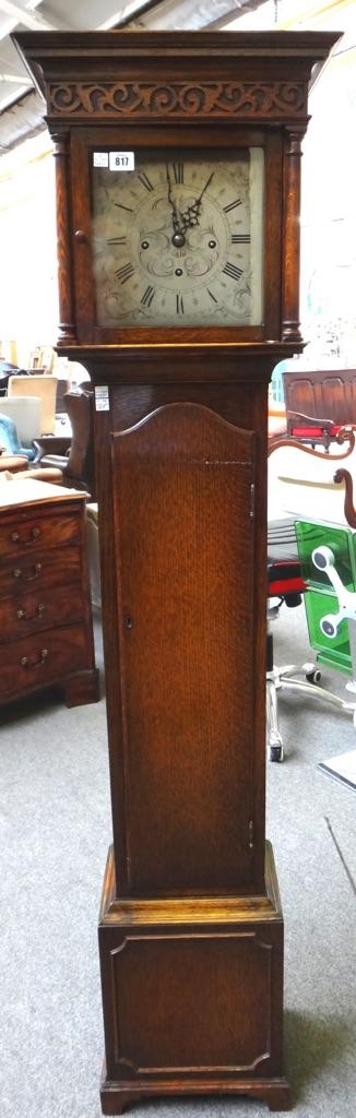 An oak cased grandmother clock, late 19th/early 20th century, with engraved silvered dial plate and a three train movement playing on a gong.  169cm h