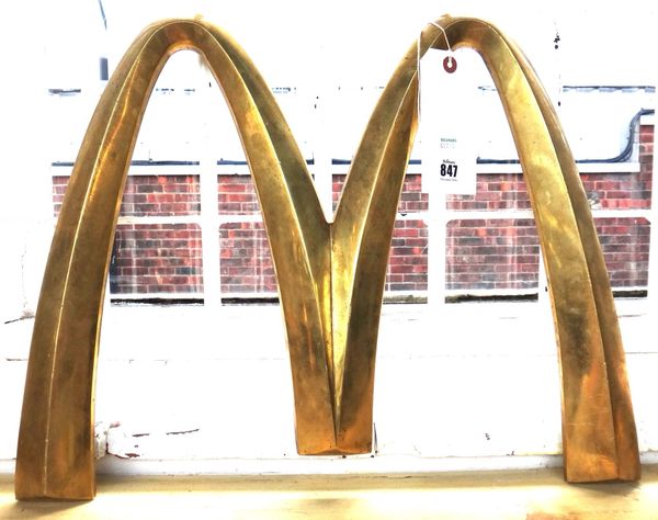 A McDonald's "Golden Arches" sign, in bronze. 40cm high