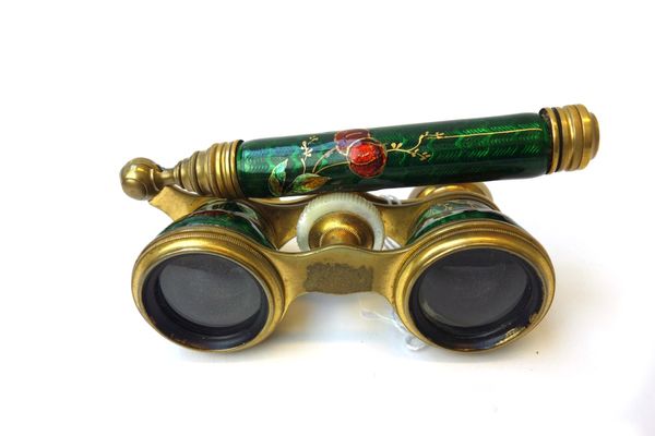 'Chavance & Co, Paris'; a pair of French enamel opera glasses, with gilt cherry enamel against a green ground, with mother of pearl eyepieces and an a