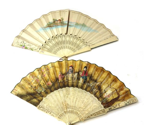 A late 18th century Continental paper fan painted with a pastoral scene, the ivory sticks carved and pierced with figures in a landscape, within a fol