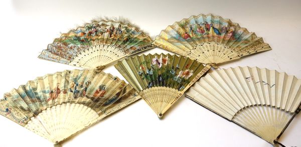A 19th century paper fan painted with a family group against a landscape, the foliate pierced and cared ivory sticks with feathered edge, 27cm, and fo