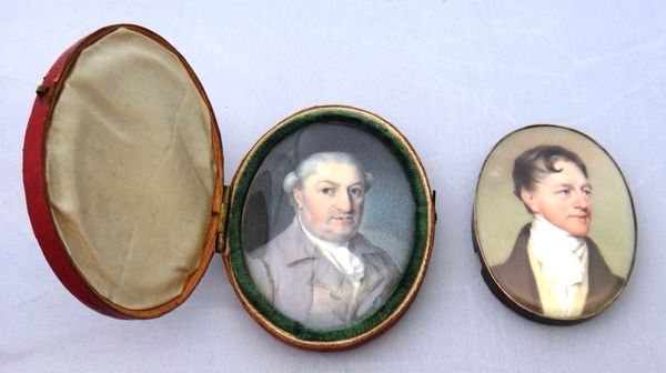 An early 19th century portrait miniature on ivory of a gentleman in a brown coat, 5cm, and another early 19th century portrait miniature on ivory of a