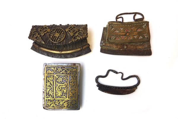 Two Tibetan leather flint and tinder pouches with iron strike plate, one further iron strike plate with a snake handle, 7cm, and a Persian white and g