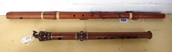A Forster boxwood and ivory banded flute, 65.5cm, and a modern brass banded flute (af) (2).