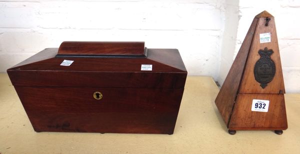 A Kohler & Son mahogany cased metronome of obelisk form, 23cm high and a Victorian mahogany tea caddy of sarcophagus form, 30.5cm wide (2).