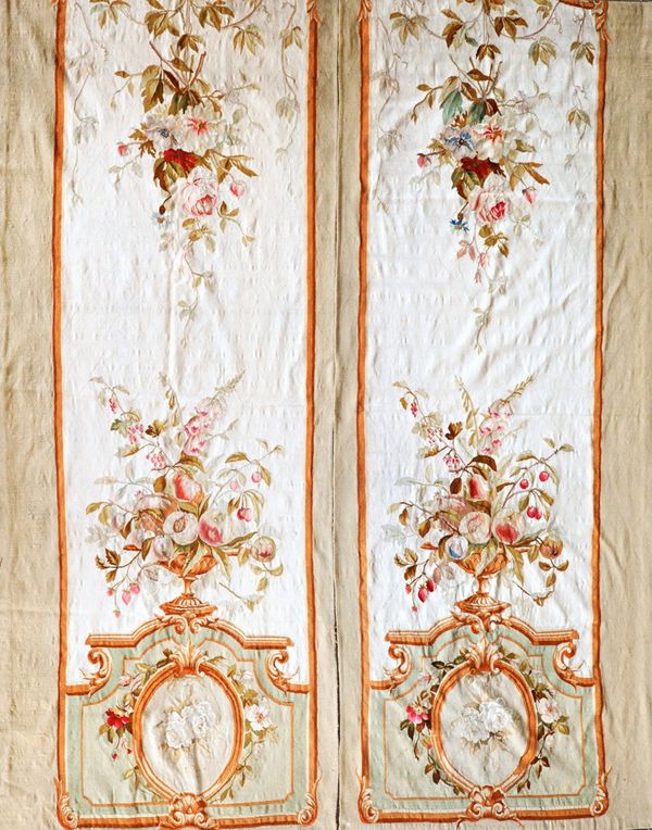 A pair of large French Aubusson hangings, late 19th century, each foliate decorated, 320 x 125cm (2). Illustrated