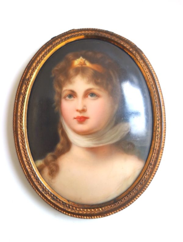 A small Hutschenreuther porcelain oval plaque, late 19th century, painted with a head and shoulders portrait of Princess Louise of Mecklenburg-Strelit