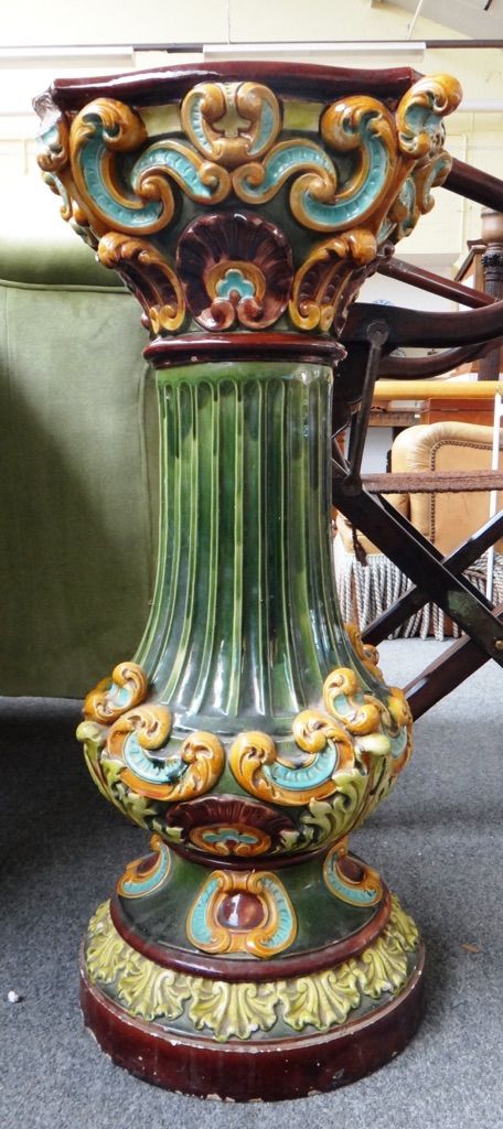 A 19th century Majolica jardiniere stand by Doulton Lambeth, 81cm high.