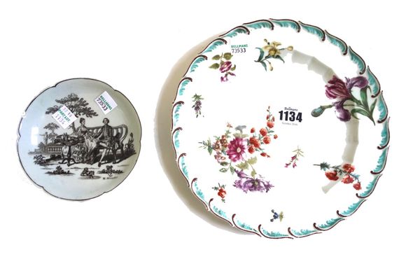 A Chelsea porcelain plate, circa 1760, painted with scattered flowers inside a turquoise and brown feather moulded rim, brown anchor mark, 21cm.diamet