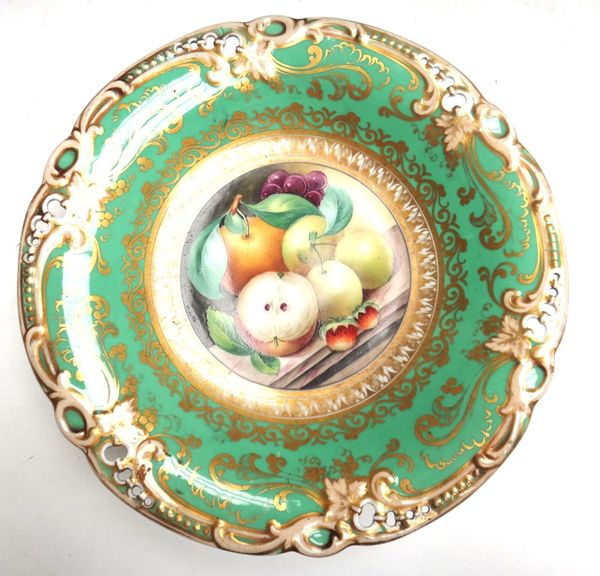 A Ridgway pierced apple green ground part dessert service, circa 1850, each painted to the centre with still life fruit upon a marbled surface within