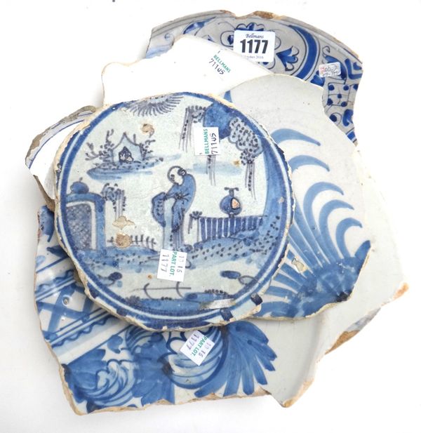 A group of five Dutch Delft blue and white shards, 17th century, excavated in Holland circa 2000/2001, comprising; one painted with the Arms of Amster