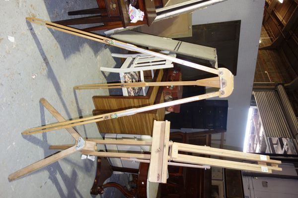 Two similar 20th century pine artist's easels, (2).    I3