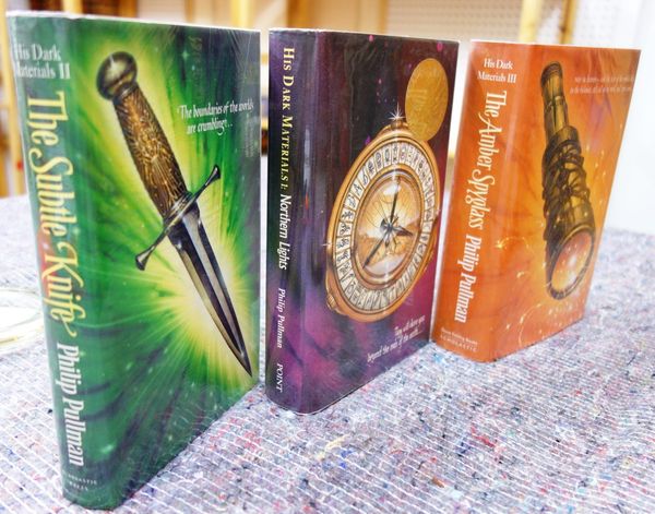 PULLMAN (P.)  His Dark Materials, 3 vols. First Editions. d/wrappers, 1995-2000.  * signed copies -   vols. 1 & 2 with (?) publisher's signed 'present