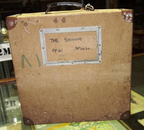 A feature film reel box.Provenance: from the estate of a camera man who worked on 'The Shining' film (1980) by Stanley Kubrick. CAB
