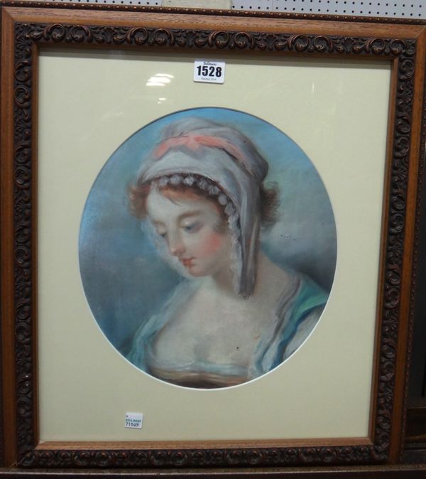 French School (19th century), Study of a serving girl, pastel, oval, 30cm x 27cm.