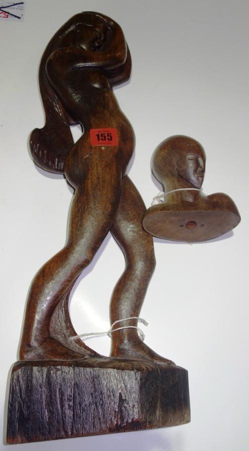 Two carved hardwood figures, one of a standing figure the other of a bust, (2). CAB