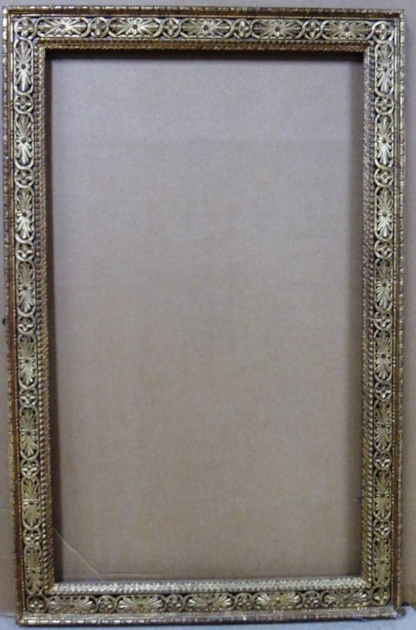A 20th century carved and pierced giltwood frame, the aperture 71.5cm wide x 120cm high. Illustrated