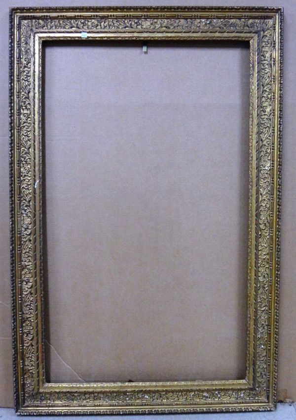 A 20th century carved and plaster gilt frame, the aperture 74cm wide x 121cm high.