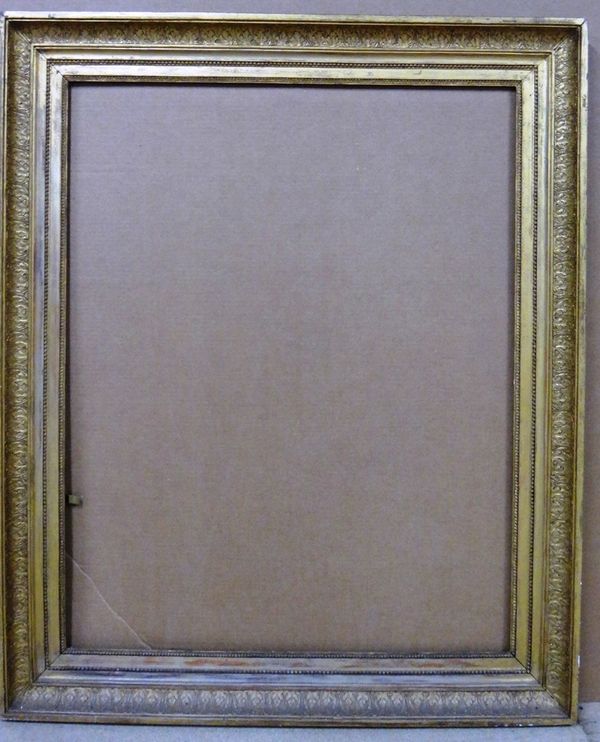 A 19th century gilt plaster frame with foliate and beaded decoration, the aperture 82cm wide x 104cm high.