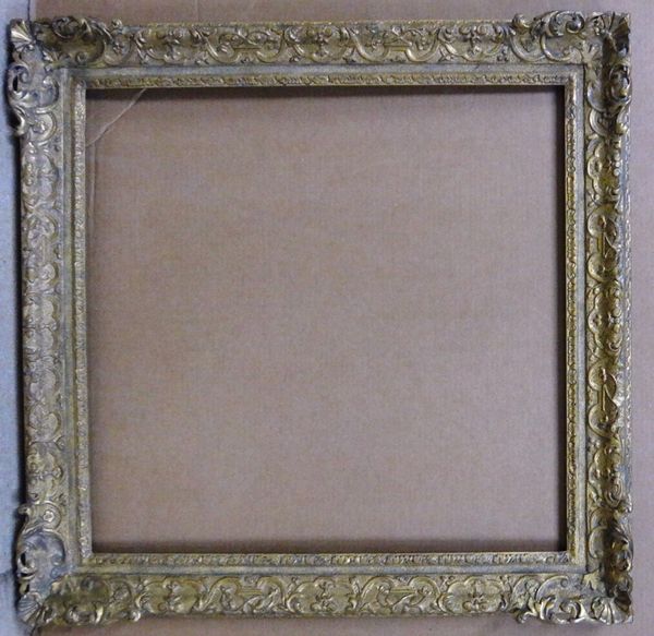 A 20th century gilt plaster swept frame with foliate decoration, the aperture 72cm wide x 74cm high.