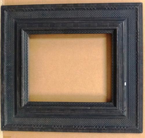A Dutch 17th century style dark stained wood frame, the aperture 42cm wide x 52cm high.