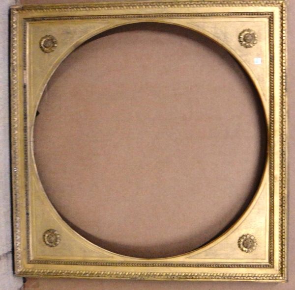 A 20th century gilt plaster frame with circular insert, with beaded and rosette decoration, the aperture 73cm x 73cm. Illustrated