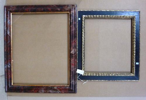 A group of four 20th century painted and ebonised frames, the largest with aperture measuring 85cm wide x 68.5cm high. (4)