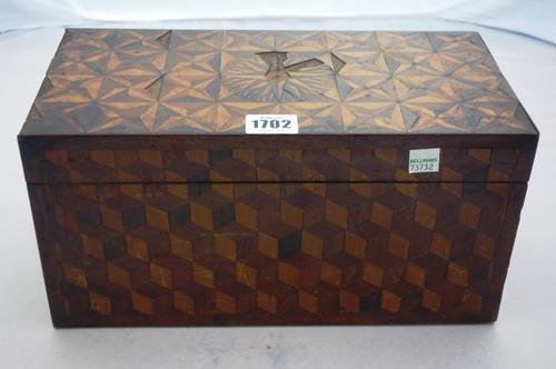 A 19th century deception cube parquetry inlaid rectangular tea caddy, 31cm wide, together with a Victorian figured walnut inlaid dome top tea caddy, 2