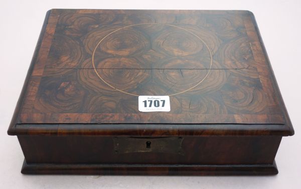 An 18th century oyster veneered laburnum rectangular lift top box, 28cm wide. Illustrated