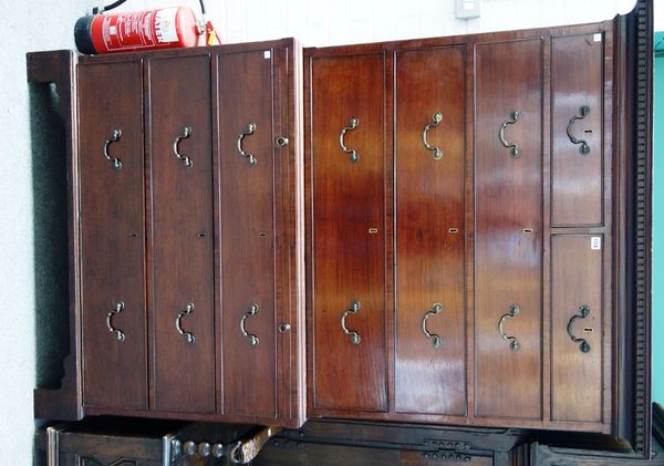 A George III mahogany chest on chest of two short and three long graduated drawers, over a brushing slide and three further long drawers, flanked by c