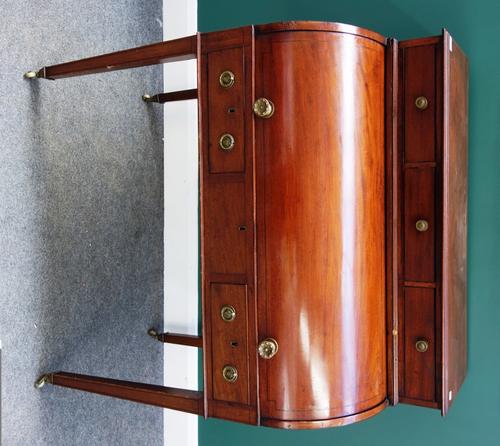 A 19th century mahogany cylinder bureau, the superstructure with three drawers, over fitted interior and two further small drawers, on square supports