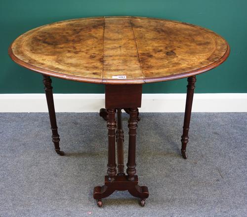 A Victorian marquetry inlaid figured walnut Sutherland table, on turned supports and stretcher, 88cm wide.