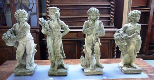 A set of four reconstituted stone figures, depicting three of the four seasons and one duplicate, each approx 80cm high (4).
