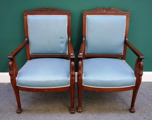 A set of six European mahogany square back open armchairs with swans head finials and bow seat on lions paw feet. (6)