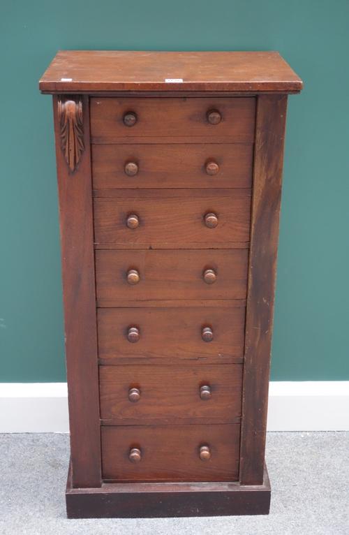 A Victorian mahogany Wellington chest with seven graduated drawers, on plinth base, 48cm wide.