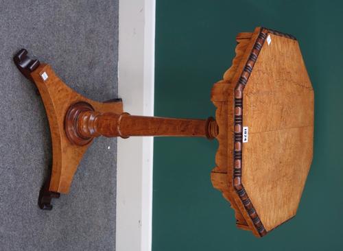 A Victorian bird's eye maple occasional table, the octagonal top with split bobbin decoration, on turned column and triform platform, 47cm wide.