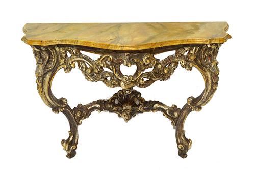 A late 19th century Italian console table, the faux painted serpentine marble top over a pierced and carved silvered base, with pair of opposing 'C' s
