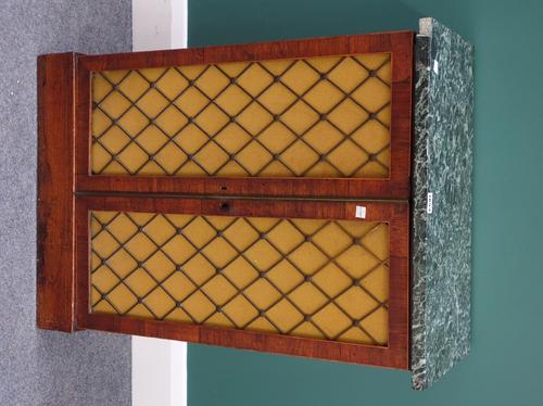 A Regency side cabinet, the marble top over a boxwood strung rosewood brass grill two door base, 57cm wide.