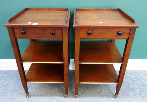A pair of brass mounted mahogany bedside tables, each with single drawer, galleried top over two open platforms, on tapering square supports, each 42c