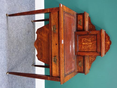 A late Victorian marquetry inlaid rosewood writing/sewing desk, the fitted superstructure over single drawer and pull-out wool box, on tapering square