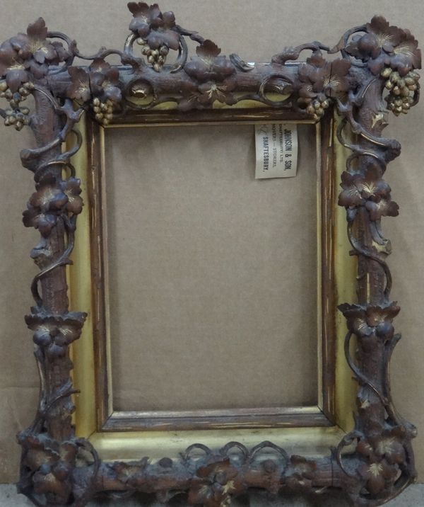 A 19th century gilt plaster frame with vine leaf decoration, aperture 29.5cm x 21.5cm.  A1
