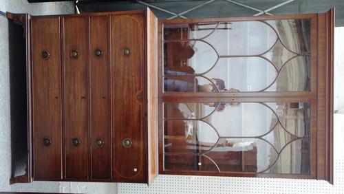 A George III mahogany secretaire bookcase, the pair of Gothic arched astragal glazed doors over fitted drawer and three further long graduated drawers