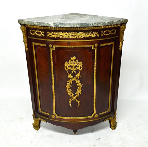 A late 19th century French encoignure/corner cabinet, the green marble top over a gilt metal mounted kingwood single door base, 106cm wide x 130cm hig