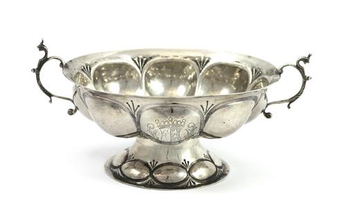 A set of eight 20th century ash and oak framed spindle back rush seated chairs of 18th century Lancashire design, including two carvers, (8).