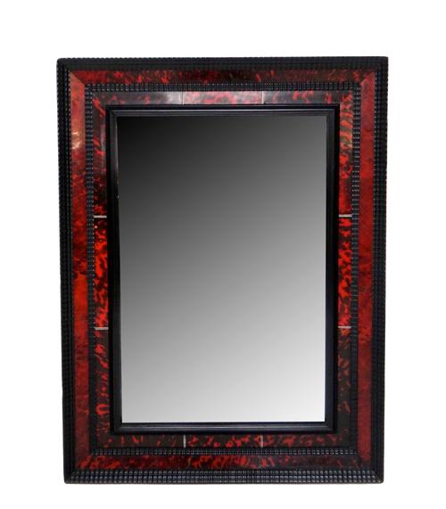 In the manner of 'Decor Frank' of Antwerp; a 19th century ripple moulded ebony and tortoiseshell rectangular wall mirror, 87cm wide x 66cm high. Illus