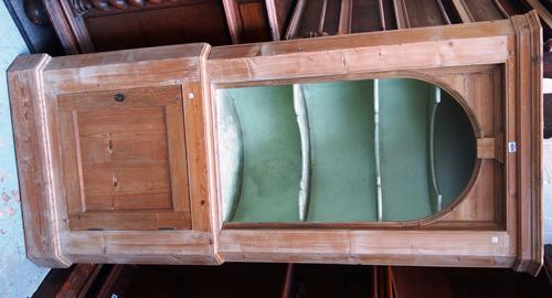 A late George III pine double height corner cupboard, with open shelf back over panelled cupboards, 90cm wide x 203cm high.