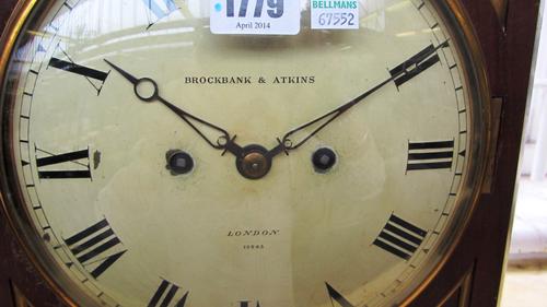 A silver octagonal twin handled bowl, the top decorated with a scroll pierced arcaded border and on a circular base, Birmingham 1922, weight 656 gms.