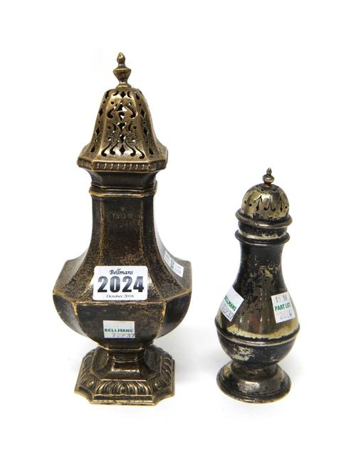 A silver sugar caster, of waisted form having decorated borders, London 1919 and a silver smaller sugar caster, possibly London 1917, combined weight