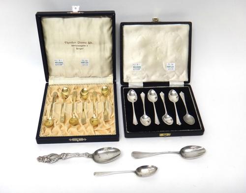 A set of six Norwegian silver gilt coffee spoons, detailed 925 S, cased, a set of six silver coffee spoons, Sheffield 1967, cased, a Sterling spoon, w