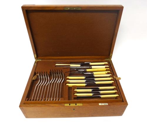 A plated Old English pattern part canteen of table flatware, comprising; four tablespoons, six soup spoons, six desert spoons,  a pair of sauce ladles